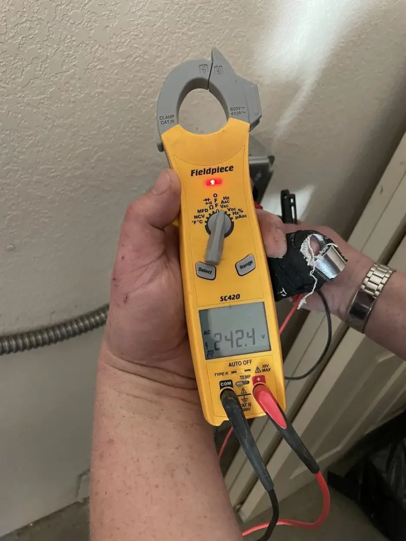 Voltage testing with clamp meter during Generator Installation in Peabody